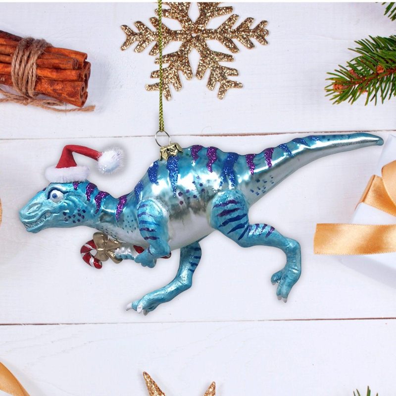 ForProductChristmasThemeDinosaurRaptorGlassOrnamentWhiteWoodBackgroundMockup