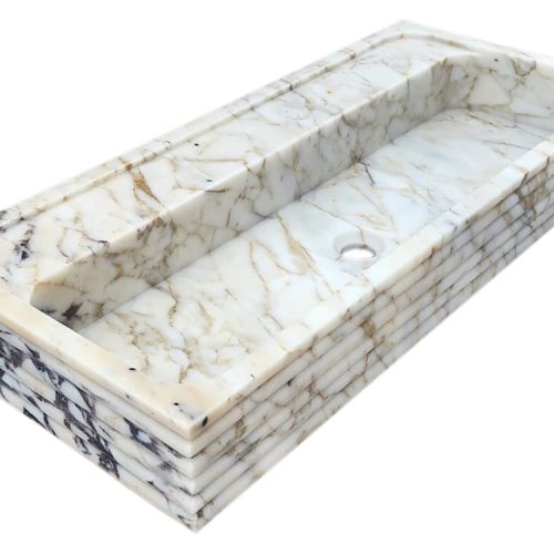 calacatta viola gold marble wall mount sink W16xL36xH5 honed horizontal fluted angle view